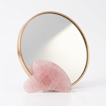 Gua sha en quartz rose pour le massage du visage